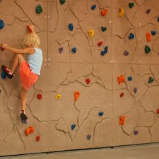 Climber climbing on Composite DIY Climbing Panels produced and sold by EP Climbing Walls